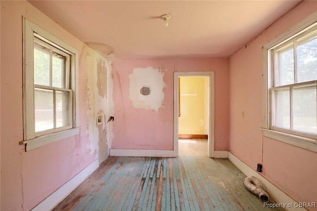 708 Calthrop Neck Rd, Yorktown, VA 23693 - empty room with hardwood / wood-style flooring and healthy amount of natural light