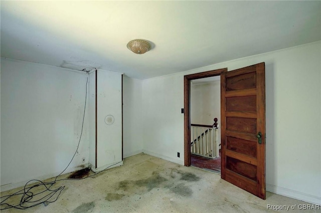 708 Calthrop Neck Rd, Yorktown, VA 23693 - unfurnished bedroom with unfinished concrete flooring