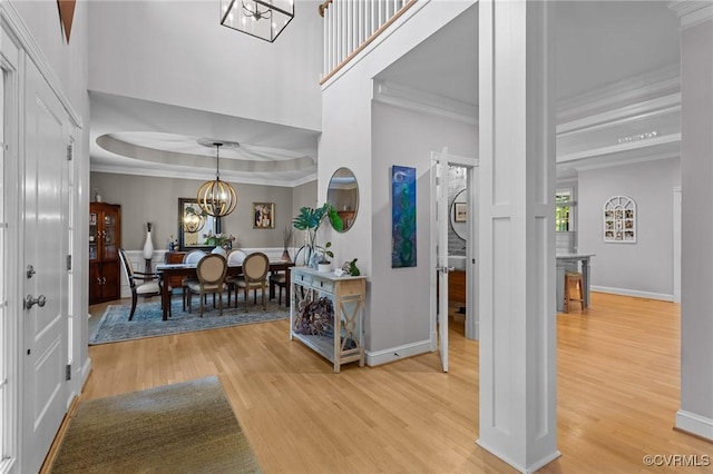 14469 St Andrews Ln, Ashland, VA 23005 - entryway featuring a chandelier, light wood-style flooring, baseboards, and ornamental molding