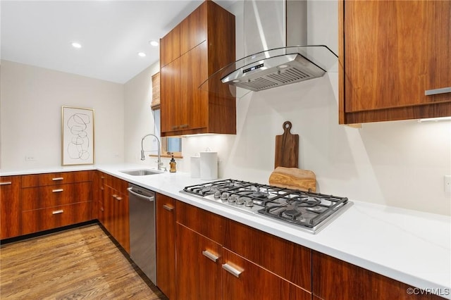 322 Charmian Rd, Richmond, VA 23226 - kitchen with wall chimney range hood, stainless steel appliances, a sink, light countertops, and modern cabinets