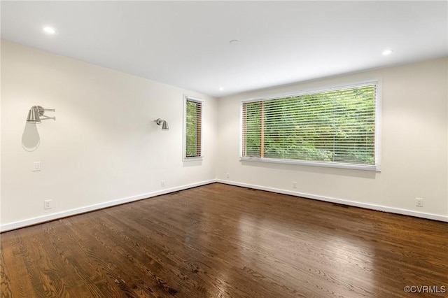 322 Charmian Rd, Richmond, VA 23226 - spare room featuring dark wood-style floors, baseboards, plenty of natural light, and recessed lighting