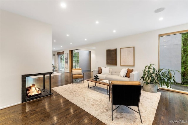 322 Charmian Rd, Richmond, VA 23226 - living room featuring dark wood-type flooring, recessed lighting, and baseboards