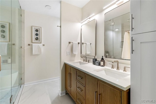 322 Charmian Rd, Richmond, VA 23226 - bathroom featuring baseboards, double vanity, an enclosed shower, and marble finish floors