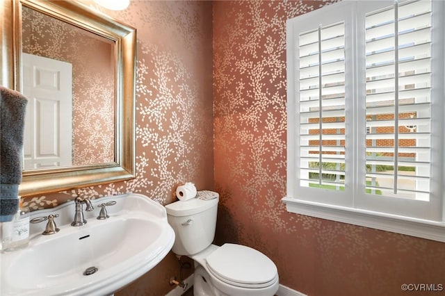 561 Hill Grove Rd, Manakin Sabot, VA 23103 - half bath with wallpapered walls, a sink, and toilet