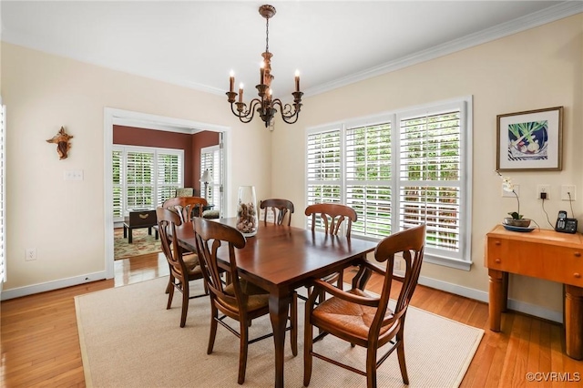 561 Hill Grove Rd, Manakin Sabot, VA 23103 - dining room with a chandelier, crown molding, healthy amount of natural light, light wood finished floors, and baseboards