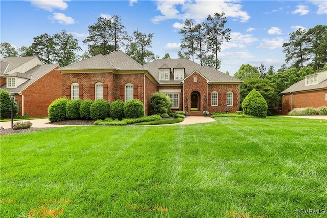 561 Hill Grove Rd, Manakin Sabot, VA 23103 - view of front of house featuring brick siding and a front yard