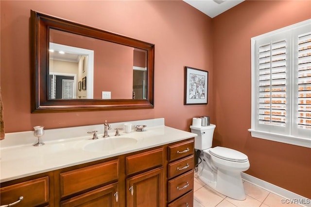 561 Hill Grove Rd, Manakin Sabot, VA 23103 - half bath featuring tile patterned floors, vanity, toilet, and baseboards