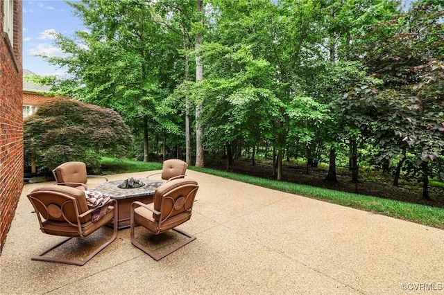 561 Hill Grove Rd, Manakin Sabot, VA 23103 - view of patio featuring a fire pit