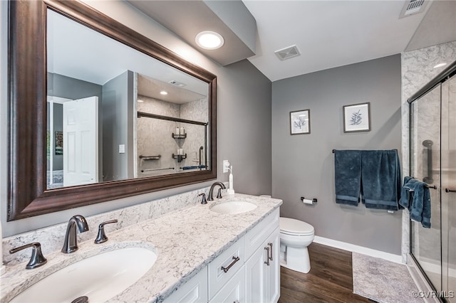 16397 Goshen Rd, Montpelier, VA 23192 - full bathroom with a shower stall, toilet, double vanity, and baseboards