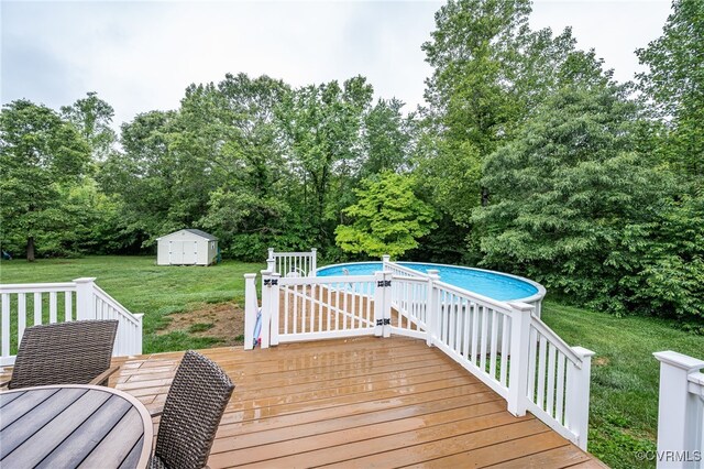 16397 Goshen Rd, Montpelier, VA 23192 - wooden deck featuring a yard, an outdoor pool, and view of wooded area