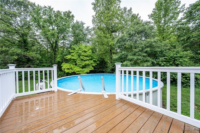 16397 Goshen Rd, Montpelier, VA 23192 - outdoor pool featuring a deck and view of wooded area
