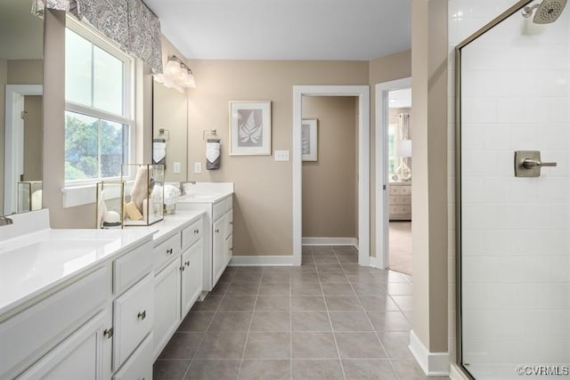 7 Abercrombie Dr, Chesterfield, VA 23838 - bathroom with double vanity, tile patterned floors, a stall shower, and baseboards