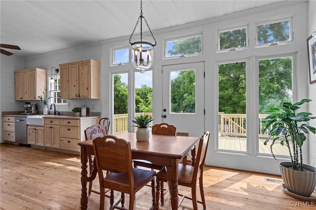 9341 Varina Rd, Henrico, VA 23231 - dining room with ornamental molding, light wood-style flooring, and ceiling fan