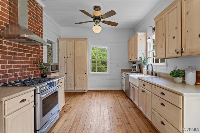9341 Varina Rd, Henrico, VA 23231 - kitchen featuring wall chimney range hood, appliances with stainless steel finishes, a sink, light brown cabinetry, and ornamental molding