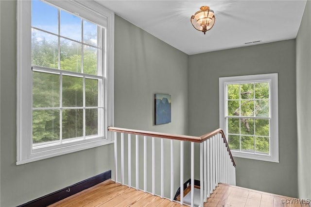 9341 Varina Rd, Henrico, VA 23231 - staircase featuring healthy amount of natural light and wood finished floors