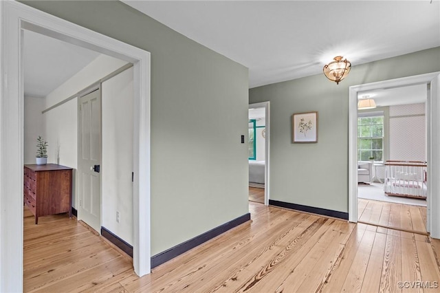 9341 Varina Rd, Henrico, VA 23231 - hallway with light wood-style flooring and baseboards