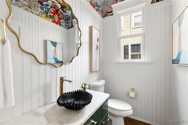 109 Libbie Ave, Richmond, VA 23226 - bathroom with toilet, vanity, and wood finished floors
