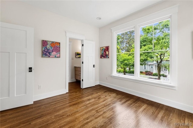 109 Libbie Ave, Richmond, VA 23226 - unfurnished bedroom featuring baseboards and wood finished floors