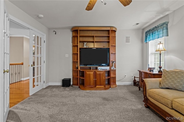 9085 Winter Spring Dr, Mechanicsville, VA 23116 - carpeted living room featuring ceiling fan, french doors, and baseboards