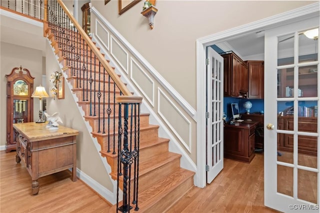 9085 Winter Spring Dr, Mechanicsville, VA 23116 - staircase featuring wood finished floors, baseboards, and french doors