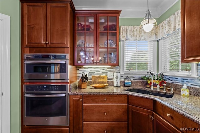 9085 Winter Spring Dr, Mechanicsville, VA 23116 - kitchen featuring double oven, a sink, backsplash, light stone counters, and crown molding