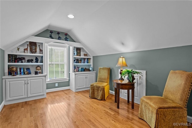 9085 Winter Spring Dr, Mechanicsville, VA 23116 - living area with vaulted ceiling, light wood-style floors, and baseboards
