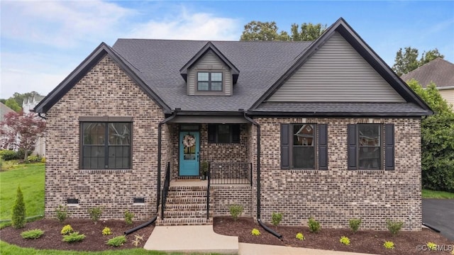 9074 Winter Spring Dr, Mechanicsville, VA 23116 - view of front facade featuring brick siding, roof with shingles, and crawl space