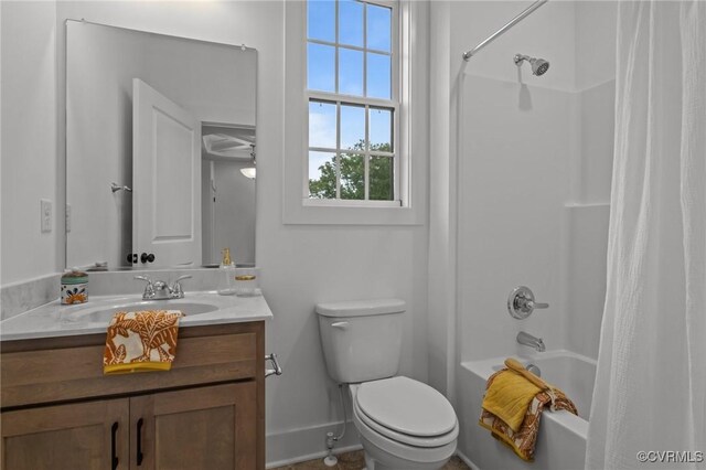 9074 Winter Spring Dr, Mechanicsville, VA 23116 - bathroom featuring vanity, toilet, shower / tub combo with curtain, and baseboards