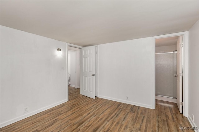 3027 Supply Rd, Port Royal, VA 22436 - unfurnished bedroom with wood finished floors and baseboards