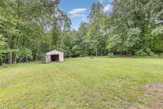 3027 Supply Rd, Port Royal, VA 22436 - view of green lawn with a view of trees and an outbuilding