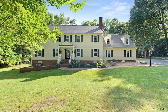 9501 Gadwell Ter, Chesterfield, VA 23838 - colonial house with a front yard and a chimney