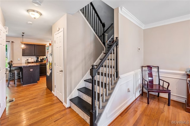 3218 Rimswell Ct, Midlothian, VA 23112 - stairs with wood finished floors, crown molding, and wainscoting