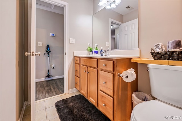 3218 Rimswell Ct, Midlothian, VA 23112 - bathroom with tile patterned flooring, vanity, toilet, and baseboards