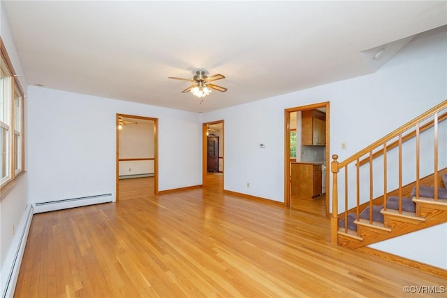 6495 Robin Way, Mechanicsville, VA 23111 - empty room with light wood-type flooring, stairs, a ceiling fan, a baseboard radiator, and baseboards