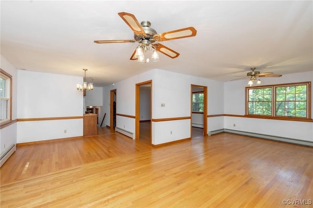 6495 Robin Way, Mechanicsville, VA 23111 - empty room featuring baseboard heating, ceiling fan, light wood-style floors, and a chandelier