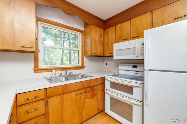 6495 Robin Way, Mechanicsville, VA 23111 - kitchen featuring white appliances, light countertops, a sink, and brown cabinets