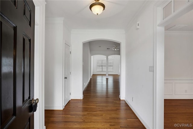 4905 Old Millrace Pl, Glen Allen, VA 23059 - hallway with wood finished floors, arched walkways, crown molding, and baseboards