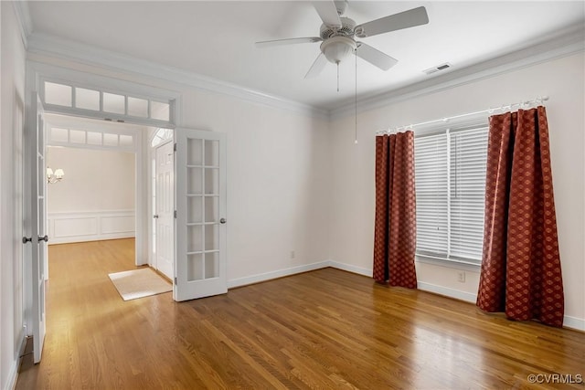 4905 Old Millrace Pl, Glen Allen, VA 23059 - spare room with ornamental molding, wood finished floors, a ceiling fan, baseboards, and plenty of natural light