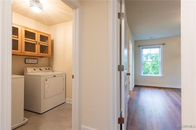 207 Eliza Ln, Aylett, VA 23009 - washroom featuring washer and clothes dryer, baseboards, and light floors