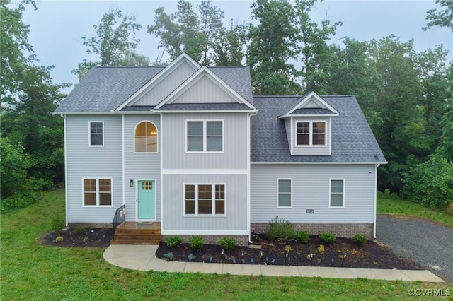 207 Eliza Ln, Aylett, VA 23009 - view of front of house featuring a shingled roof and a front lawn