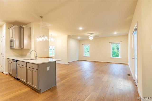 207 Eliza Ln, Aylett, VA 23009 - kitchen featuring gray cabinetry, a sink, appliances with stainless steel finishes, light countertops, and recessed lighting