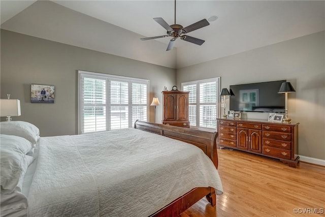 14101 Ashton Cove Dr, Midlothian, VA 23113 - bedroom with light wood-style floors, lofted ceiling, a ceiling fan, and baseboards