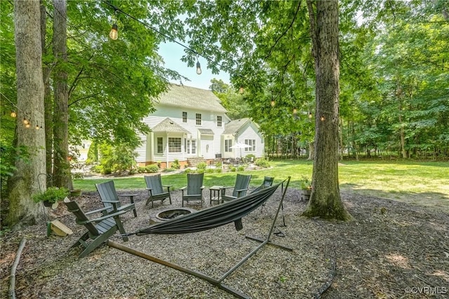 14101 Ashton Cove Dr, Midlothian, VA 23113 - view of grassy yard with a fire pit
