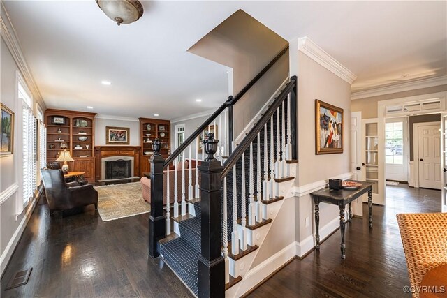 4029 Huntsteed Way, Henrico, VA 23233 - entrance foyer featuring ornamental molding, dark wood-style flooring, stairs, recessed lighting, and a fireplace