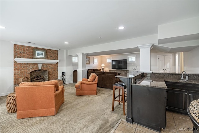 4029 Huntsteed Way, Henrico, VA 23233 - living area with a brick fireplace, decorative columns, light carpet, and recessed lighting