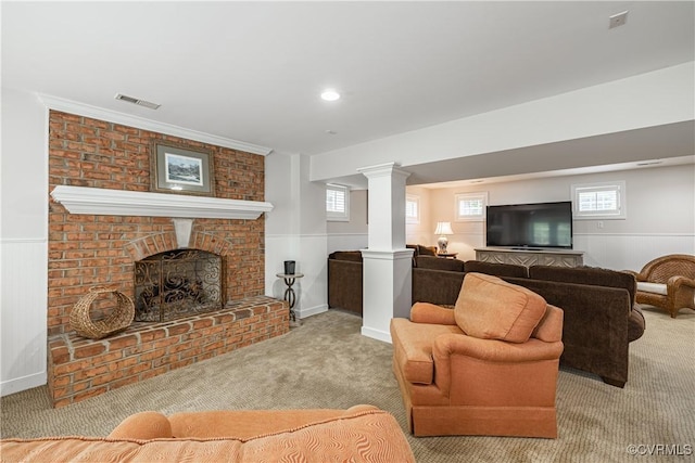 4029 Huntsteed Way, Henrico, VA 23233 - carpeted living area featuring wainscoting, ornate columns, and a brick fireplace