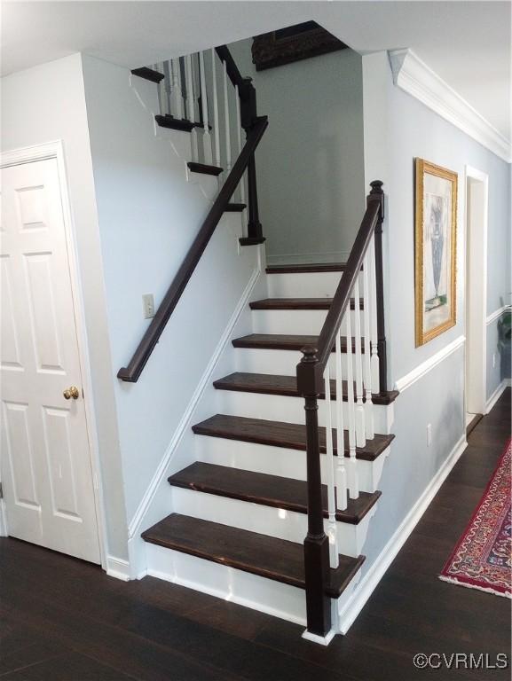 1412 Pritchard Ter, Chesterfield, VA 23235 - stairway with wood finished floors, baseboards, and crown molding