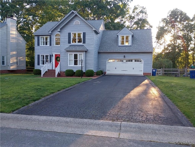 1412 Pritchard Ter, Chesterfield, VA 23235 - view of front of house featuring a shingled roof, asphalt driveway, and an attached garage