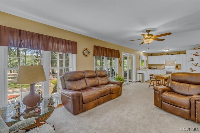 431 Ships Row, Montross, VA 22520 - living room with light colored carpet and ceiling fan