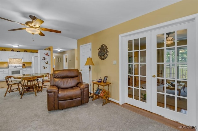 431 Ships Row, Montross, VA 22520 - living room featuring a ceiling fan, french doors, and light colored carpet